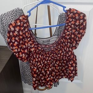 Two urban outfitters floral shirts $11 each